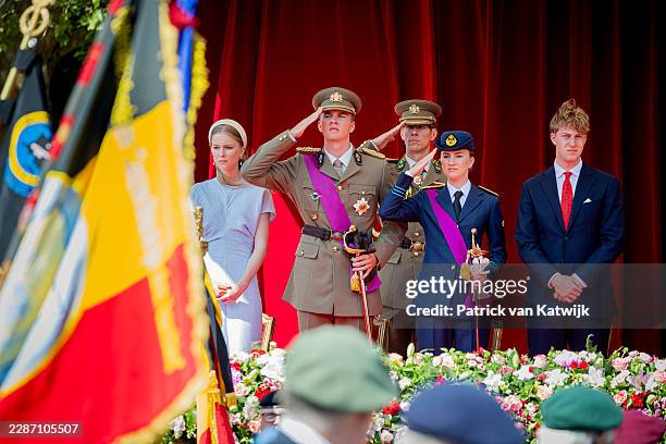 Princess Eleonore of Belgium, Prince Gabriel of Belgium, Princess Elisabeth of Belgium and Prince Emmanuel of Belgium attend the military parade...
