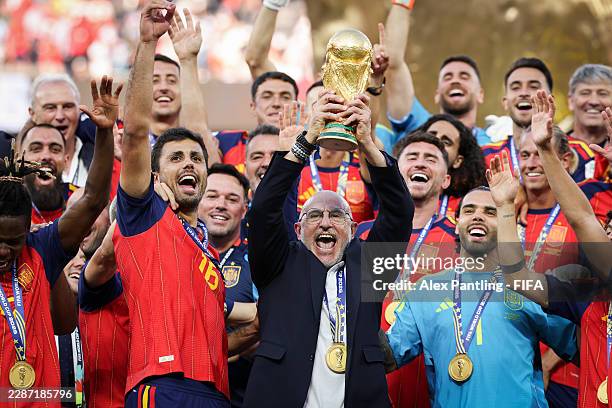 Luis De La Fuente, Head Coach of Spain, lifts the FIFA World Cup Winner’s Trophy after the team’s victory following the FIFA World Cup 2026 Final...