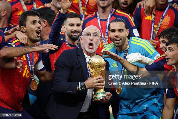Luis De La Fuente, Head Coach of Spain, lifts the FIFA World Cup Winner’s Trophy after the team’s victory following the FIFA World Cup 2026 Final...