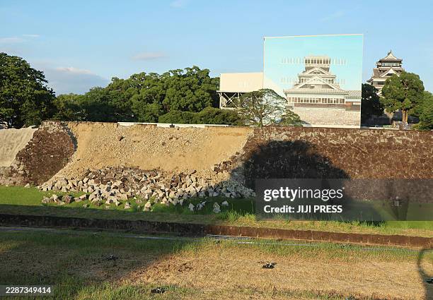 The collapsed stone walls of Kumamoto Castle are seen after an earthquake, in Kumamoto City on July 28, 2026. A major earthquake collapsed buildings...