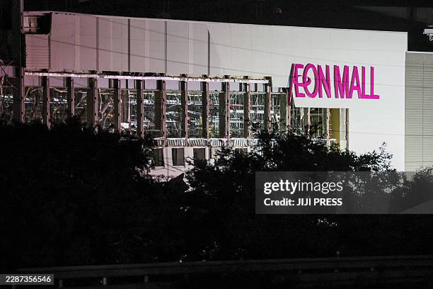 Damaged wall is seen on the side of Aeon Mall Kumamoto after an earthquake in Kashima on July 28, 2026. "Many people" were feared trapped in a...