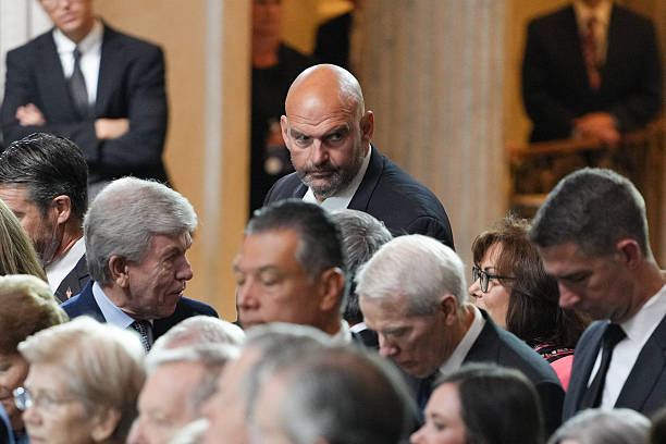 Senator John Fetterman, Democrat from Pennsylvania, joins US Senators as he arrives for a Congressional tribute to late US Senator Lindsey Graham in...