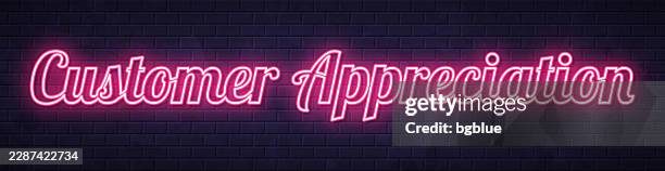customer appreciation - glowing neon text on brick wall background - client appreciation stock illustrations