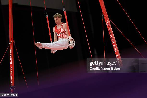 Harry Eyres of Team Isle of Man competes in Rings during the Men's Team Final and Individual Qualification on day one of the Glasgow 2026...