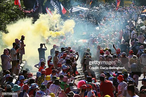 General view of the peloton compete climbing to the Alpe d'Huez while fans cheers during the 113th Tour de France 2026, Stage 19 a 127.9km stage from...