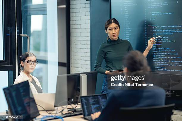 knowledge sharing in software development enhances team efficiency, expedites onboarding, and minimizes redundant efforts, ultimately translating individual expertise into collective capability. - devops stock pictures, royalty-free photos & images