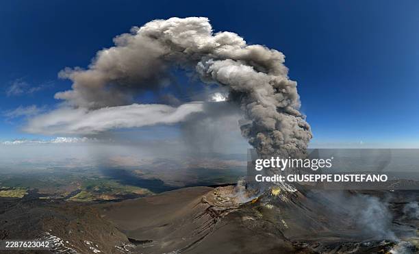 Plum of ashes rises from a crater of the Mount Etna volcano during an eruption on July 30, 2026.
