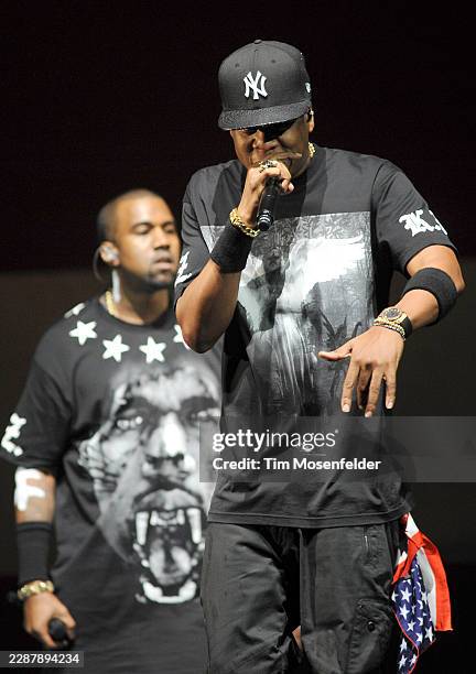 Kanye West and Jay-Z perform during the "Watch The Throne Tour" at HP Pavilion on December 14, 2011 in San Jose, California.