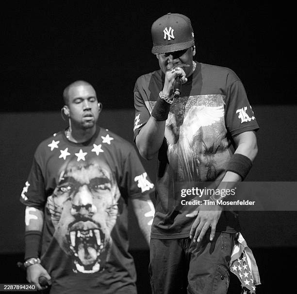 Kanye West and Jay-Z perform during the "Watch The Throne Tour" at HP Pavilion on December 14, 2011 in San Jose, California.