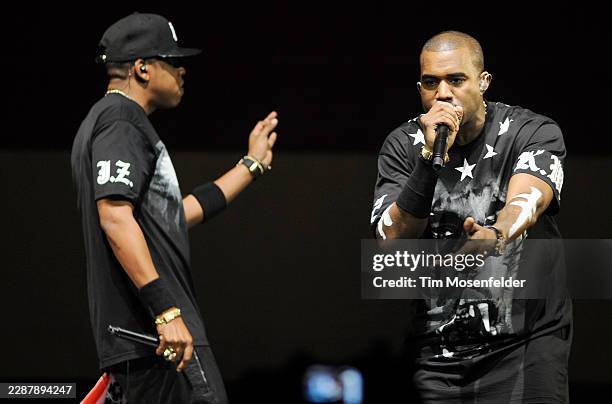 Jay-Z and Kanye West perform during the "Watch The Throne Tour" at HP Pavilion on December 14, 2011 in San Jose, California.