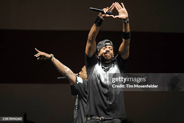 Kanye West and Jay-Z perform during the "Watch The Throne Tour" at HP Pavilion on December 14, 2011 in San Jose, California.