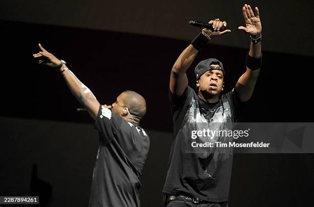 Kanye West and Jay-Z perform during the "Watch The Throne Tour" at HP Pavilion on December 14, 2011 in San Jose, California.