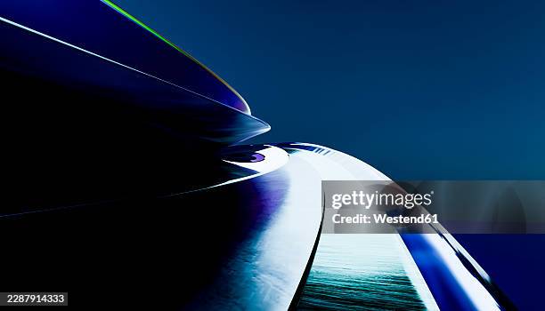 abstract aerodynamic curve with reflective surface and blue light - streamline stock illustrations