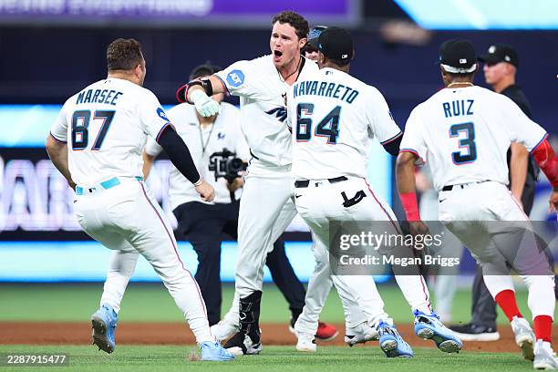 Griffin Conine of the Miami Marlins reacts after walking it off with a single in the ninth inning against the Philadelphia Phillies at loanDepot park...
