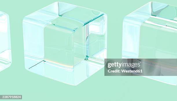 abstract transparent floating glass cube on green background - ice block stock illustrations
