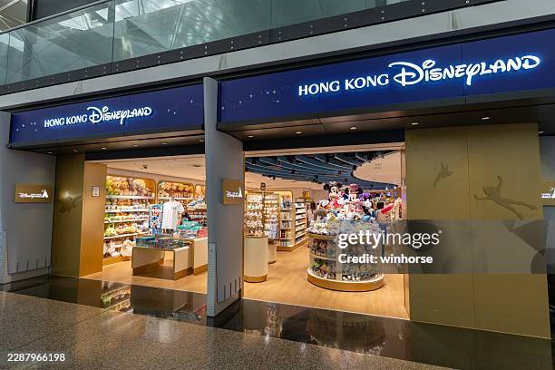 disney store at hong kong international airport - gift shop stock pictures, royalty-free photos & images