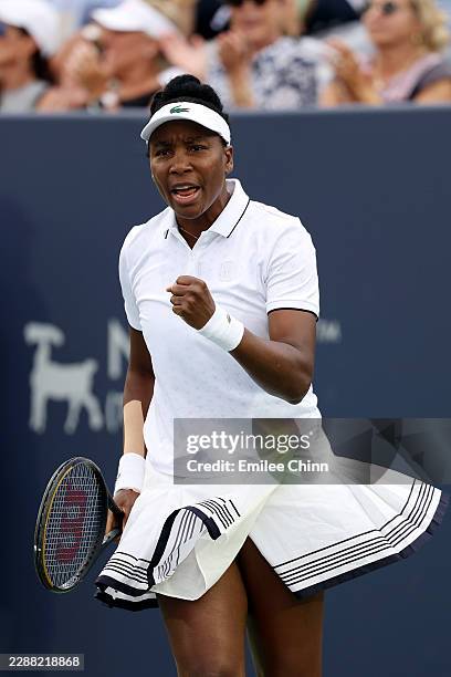 Venus Williams of the United States celebrates during a women's doubles match with Diana Shnaider against Qianhui Tang and Yifan Xu of China during...