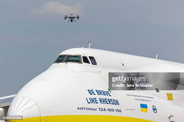 Police drone takes off next to Ukrainian Antonov cargo plane at Leipzig/Halle Airport on August 5, 2026 near Leipzig, Germany. Airport workers...