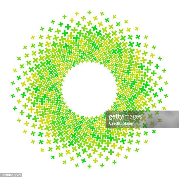 a circular ring of small green and yellow plus signs forms a dense spiral around a white center on a plain white background. - neon plus stock illustrations