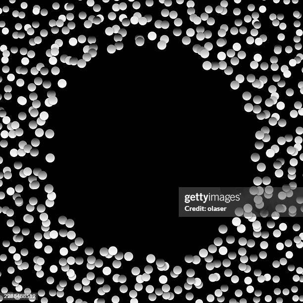 black background framed by scattered white circular dots forming a bright border around an empty center space. - table black background stock illustrations