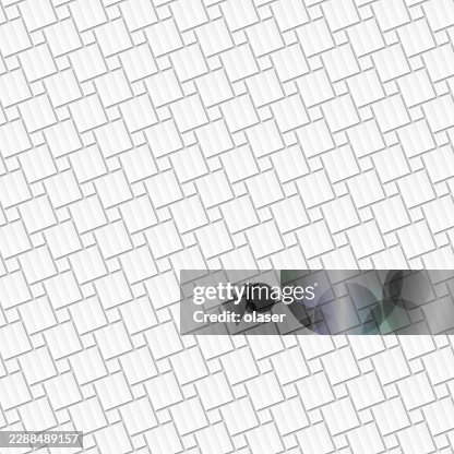 White textured pattern of overlapping rectangular panels arranged in a diagonal grid, creating a clean, repeating geometric surface with subtle shadows and depth. White textured pattern of overlapping rectangular panels arranged in a diagonal grid, creating a clean, repeating geometric surface with subtle shadows and depth.