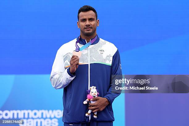 Bronze medalist Yash Vir Singh of Team India poses for a photo during the medal ceremony for the Men's Javelin Throw during the Athletics on day nine...