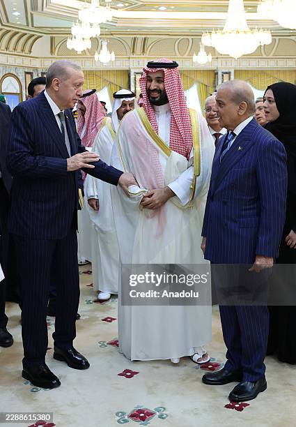 Turkish President Recep Tayyip Erdogan , Saudi Crown Prince Mohammed bin Salman and Pakistani Prime Minister Shehbaz Sharif sign a trilateral joint...