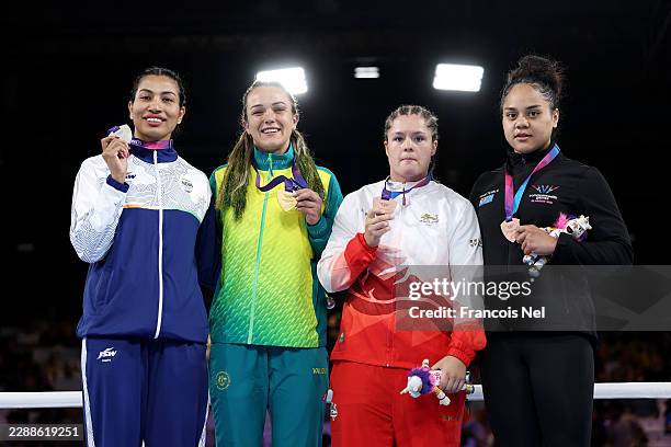 Gold medalist Emma-Sue Greentree of Team Australia, Silver medalist Lovlina Borgohain of Team India and Bronze medalists Mary Kate Smith of Team...