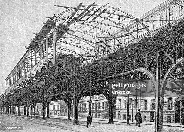 berlin, elevated railway station on gitschiner strasse under construction — iron roof arches and viaduct supports rise above a berlin street - bridge under construction stock illustrations