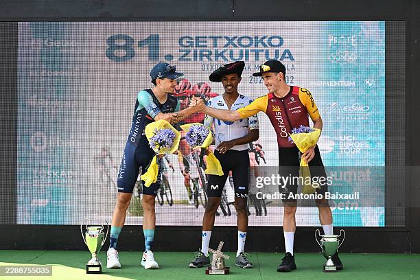 Pau Miquel of Spain and Team Bahrain - Victorious on second place, race winner Natnael Tesfatsion of Eritrea and Team Movistar and Alex Aranburu of...