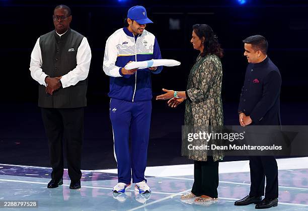 Neeraj Chopra of Team India passes the Commonwealth Sport flag to PT Usha, President, Commonwealth Games Association of India during the Closing...