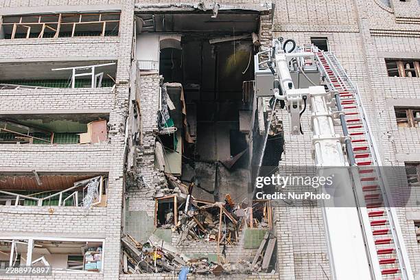 Rescuers work to extinguish a fire at the site of damaged floors in Kharkiv, Ukraine, on August 9, 2026. On the morning of August 9 Russia attacked...