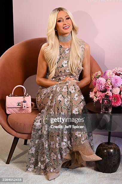 Paris Hilton attends ICONIC Eau de Parfum launch event at Florattica on August 03, 2026 in London, England.