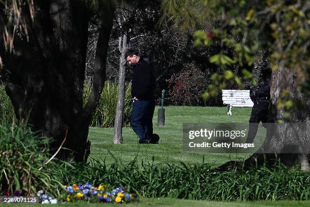 Lionel Messi walks inside the El Prado Cemetery, where his father Jorge Messi's remains will be laid in state for a private wake on August 9, 2026 in...