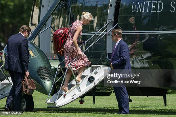 Executive assistant to U.S. President Donald Trump Natalie Harp boards Marine One en route to Joint Base Andrews from the Ellipse near the White...