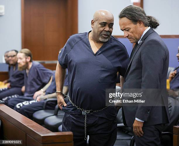 Duane Davis talks with his attorney Michael Sanft in Clark County District Court during a calendar call and motion hearing for Davis' upcoming trial...