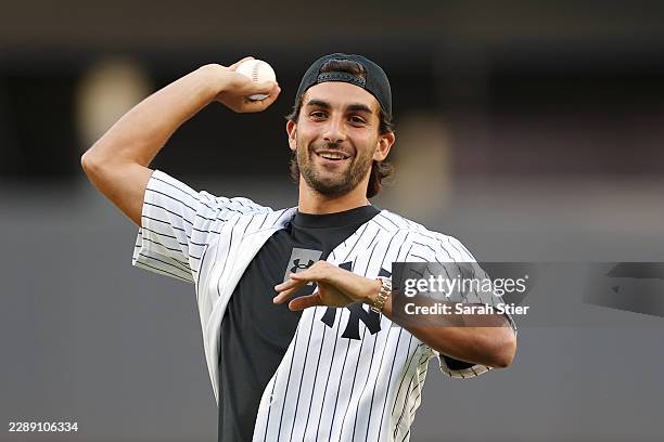 Footballer Ferran Torres of Spain throws a ceremonial first pitch ahead of the first inning between the New York Yankees and St. Louis Cardinals at...