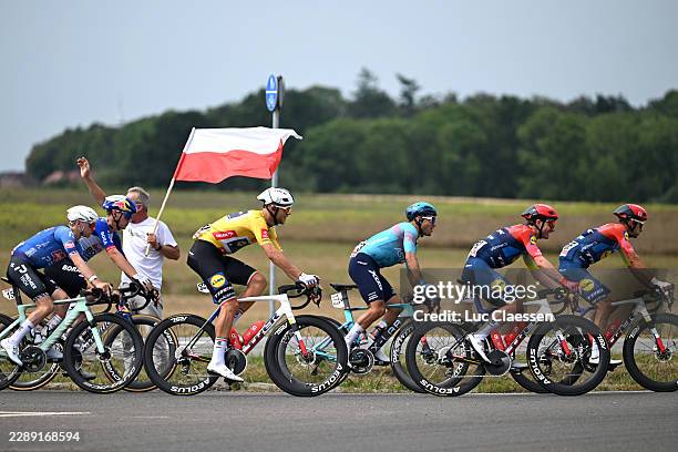 Jonathan Milan of Italy and Team Lidl - Trek - Yellow Leader Jersey, Matteo Malucelli of Italy and Team XDS Astana, Simone Consonni of Italy and...