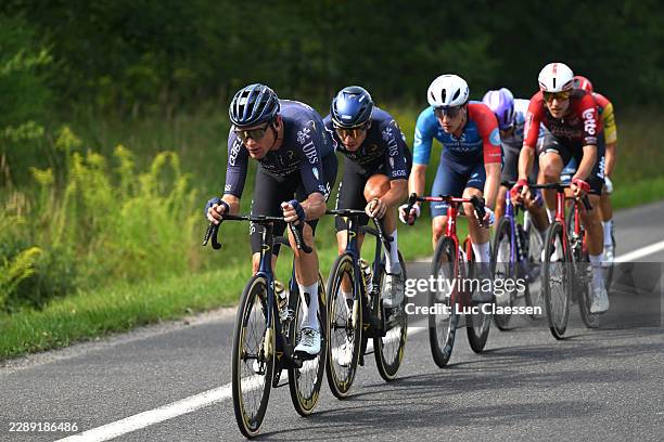 Sjoerd Bax of Netherlands, Fabio Christen of Switzerland and Team Pinarello Q36.5 Pro Cycling, Enzo Paleni of France and Team Groupama - FDJ United,...