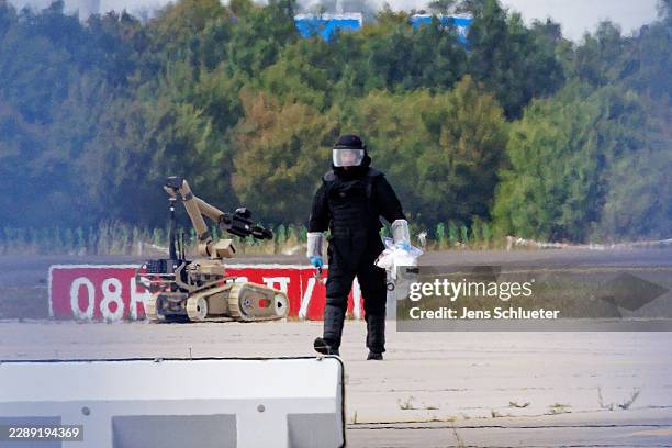 Police investigator works on the tarmac near to Ukrainian Antonov cargo plane at Leipzig/Halle Airport on August 5, 2026 near Leipzig, Germany....