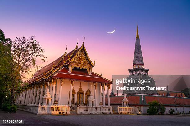 wat phra mahathat woramahawihan at twilight with crescent moon in nakhon si thammarat thailand - nakhon si thammarat stock pictures, royalty-free photos & images