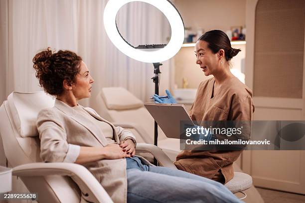 i'm renewing my youth license - med spa stock pictures, royalty-free photos & images