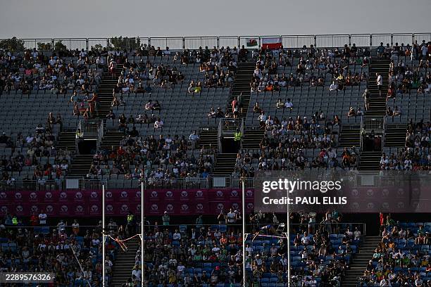 Members of the public watch athletes competing in the women's pole vault qualifier during the European Athletics Championships at Alexander Stadium...