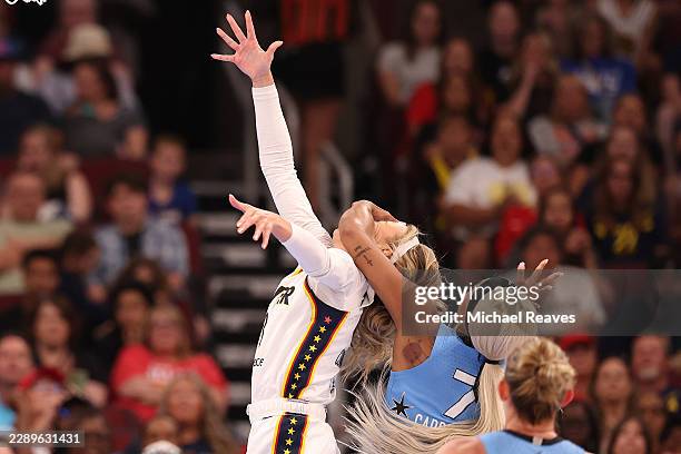Sophie Cunningham of the Indiana Fever is fouled by DiJonai Carrington of the Chicago Sky during the first half at United Center on August 08, 2026...