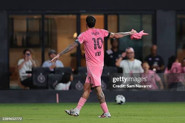 Rodrigo De Paul of Inter Miami CF shows the jersey of teammate Lionel Messi after the passing of his father, Jorge Messi, after scoring the team's...