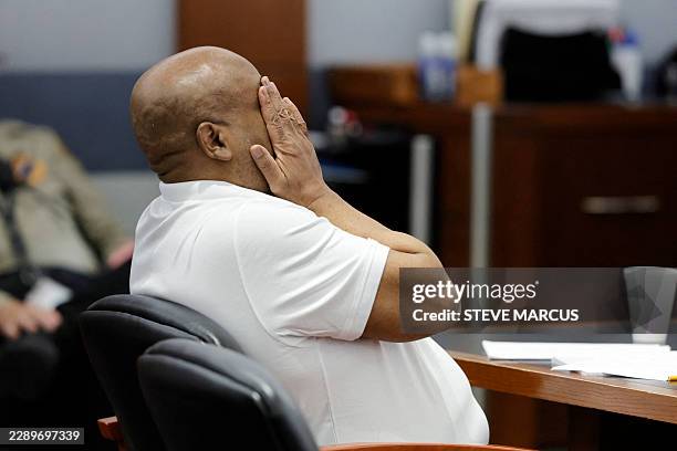 Duane Davis rubs his face during the third day of jury selection in his murder trial, related to the 1996 killing of rapper Tupac Shakur, at Clark...