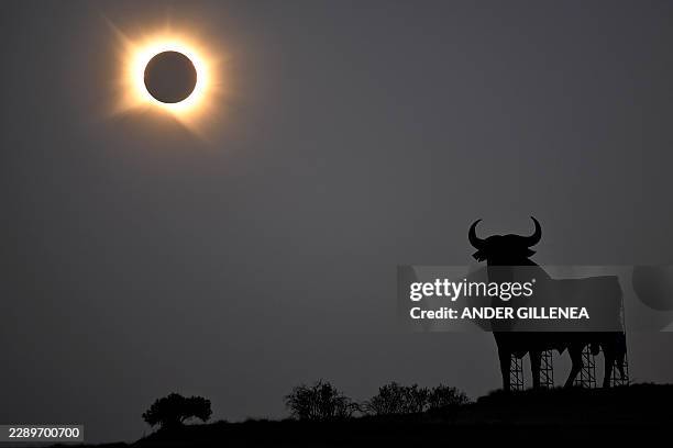 The Sun's corona glows as the Moon completely blocks the Sun during the totality phase of the total solar eclipse as seen from San Asensio, La Rioja...