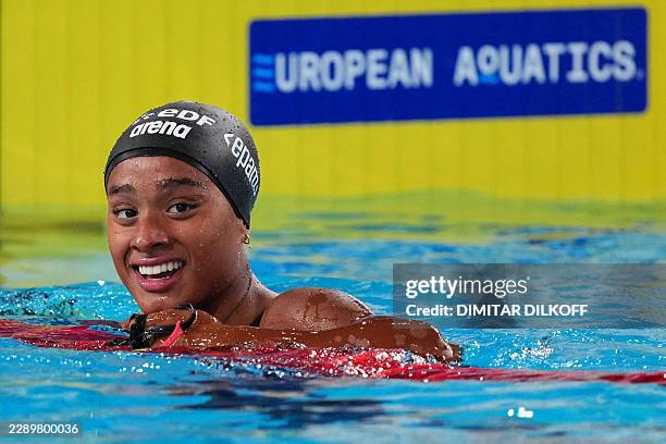 Italy's Sara Curtis celebrates after setting a new world record in the final of the women's 50m backstroke swimming event during the LEN European...