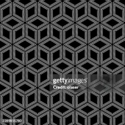 Repeating white dotted cube outlines form a dense geometric pattern on a black background, creating a striking optical illusion with strong symmetry and visual rhythm. Repeating white dotted cube outlines form a dense geometric pattern on a black background, creating a striking optical illusion with strong symmetry and visual rhythm.