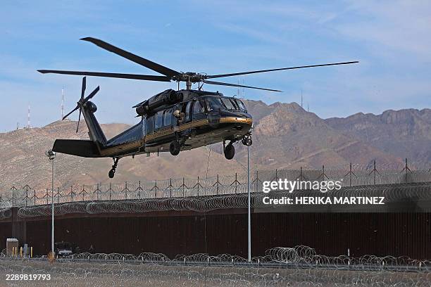 Customs and Border Protection Air and Marine Operations officers conduct a demonstration with a helicopter, of their rapid response capabilities...